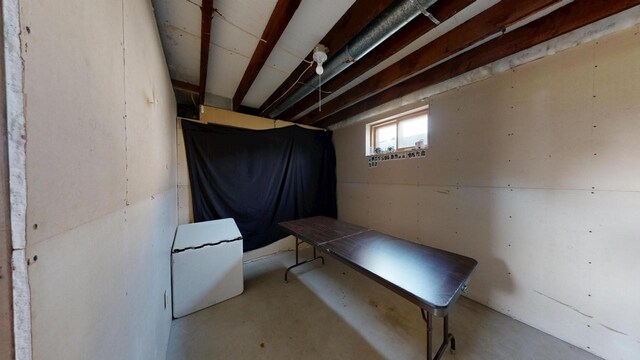 misc room with concrete floors