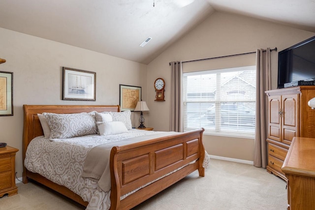 bedroom with baseboards, light carpet, vaulted ceiling, and visible vents