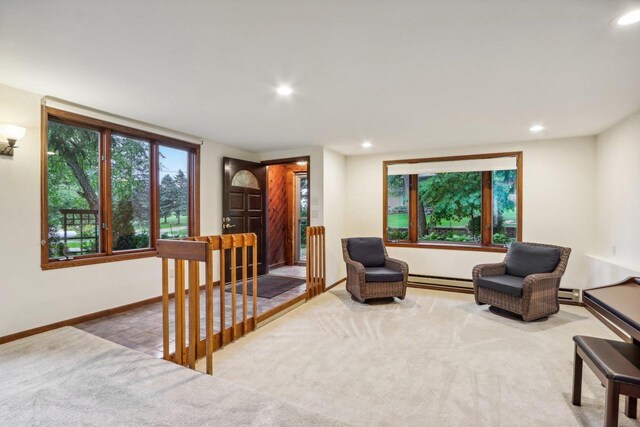 W10134 Schiefelbein Rd, Poynette, WI 53955 - living area with carpet floors, recessed lighting, baseboards, and baseboard heating