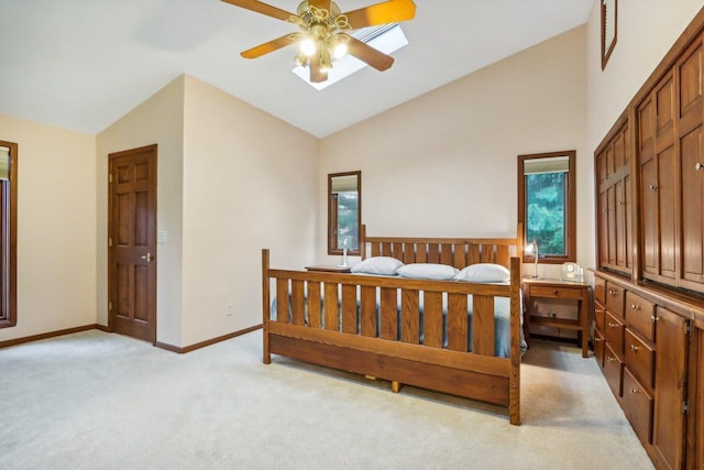 W10134 Schiefelbein Rd, Poynette, WI 53955 - bedroom with baseboards, a ceiling fan, high vaulted ceiling, and light carpet