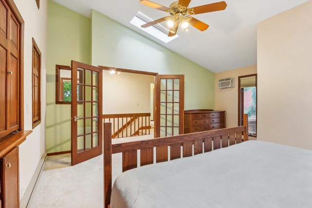 W10134 Schiefelbein Rd, Poynette, WI 53955 - bedroom featuring high vaulted ceiling, light colored carpet, a wall mounted AC, french doors, and a skylight