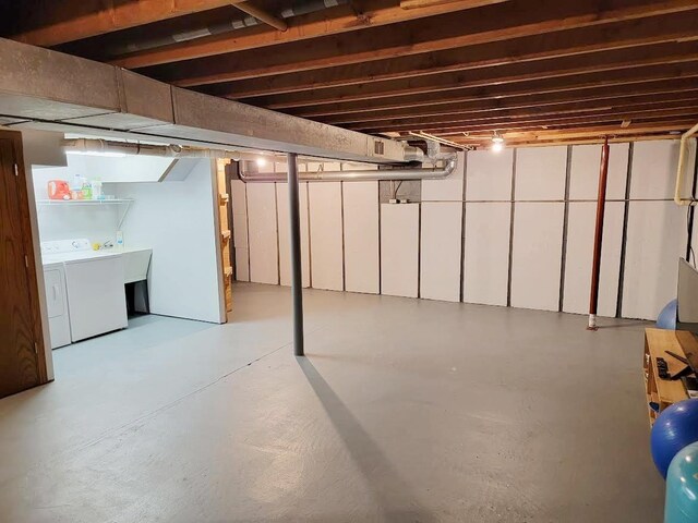 W10134 Schiefelbein Rd, Poynette, WI 53955 - finished basement featuring washer and clothes dryer