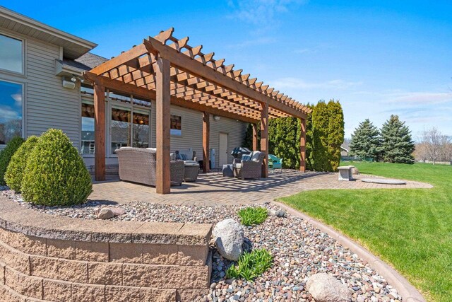 view of patio with a pergola and outdoor lounge area