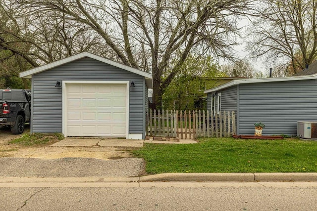 304 Mitchell St, Belleville, WI 53508 - detached garage featuring fence