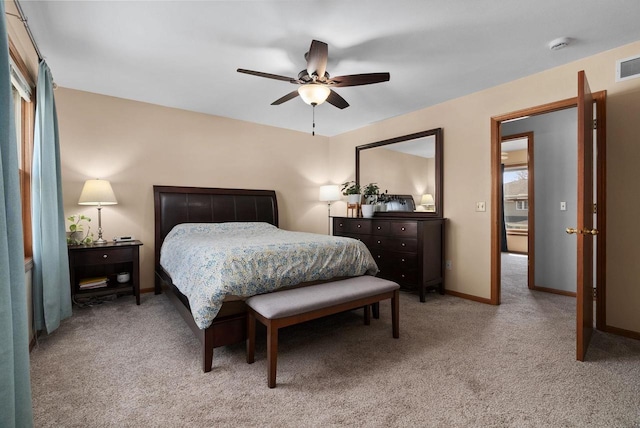 bedroom with visible vents, carpet, ceiling fan, and baseboards