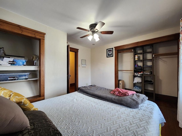 bedroom featuring ceiling fan and a closet