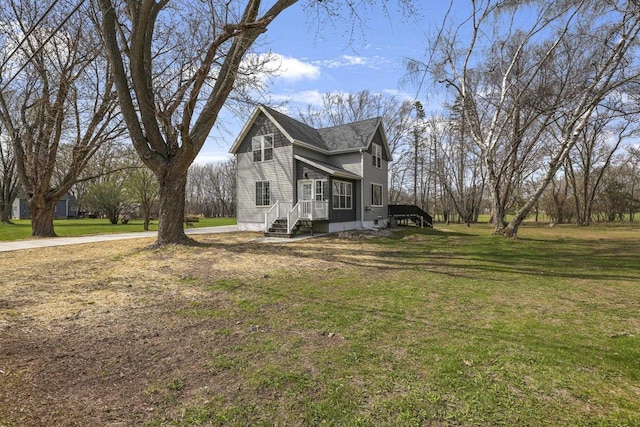 view of home's exterior featuring a lawn