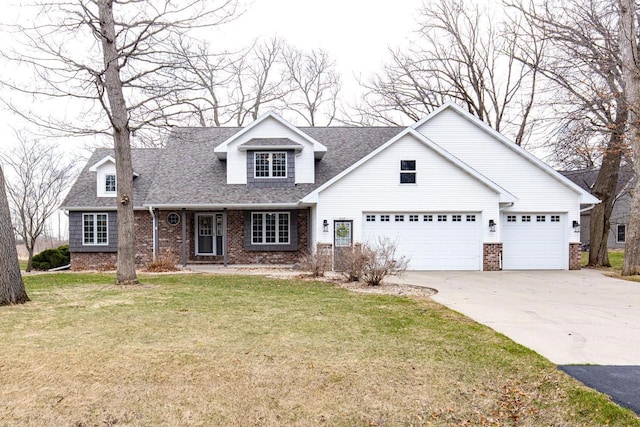 4175 Twilight Ct, Oshkosh, WI 54904 - new england style home featuring a shingled roof, brick siding, a garage, a front yard, and driveway