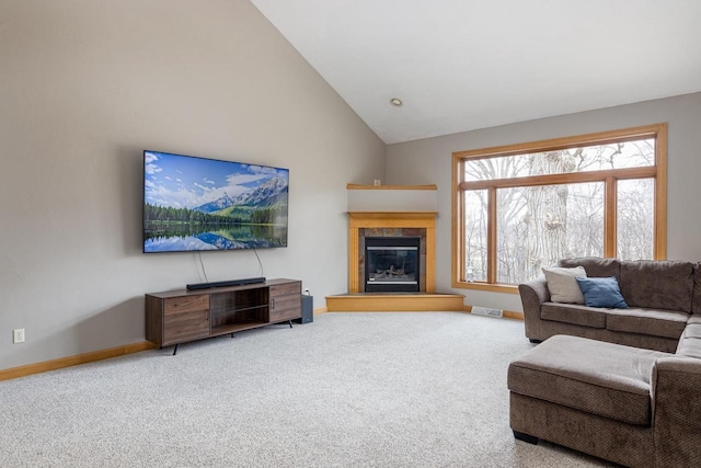 4175 Twilight Ct, Oshkosh, WI 54904 - carpeted living area with baseboards, visible vents, a fireplace, and lofted ceiling