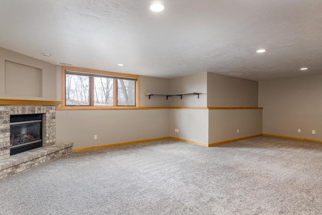 4175 Twilight Ct, Oshkosh, WI 54904 - unfurnished living room with baseboards, a fireplace, carpet flooring, and recessed lighting