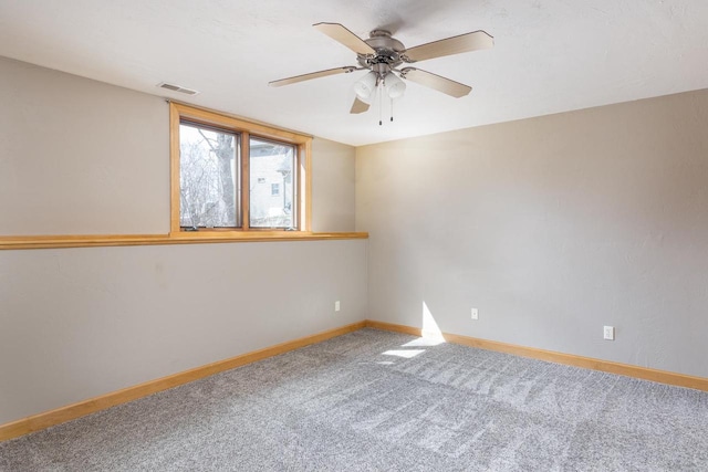 4175 Twilight Ct, Oshkosh, WI 54904 - empty room featuring baseboards, carpet, a ceiling fan, and visible vents