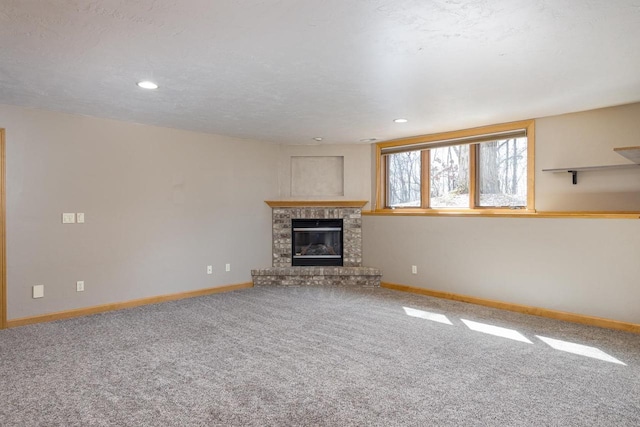 4175 Twilight Ct, Oshkosh, WI 54904 - unfurnished living room with carpet floors, recessed lighting, baseboards, and a fireplace