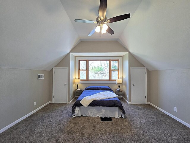 bedroom featuring visible vents, a ceiling fan, carpet floors, and lofted ceiling