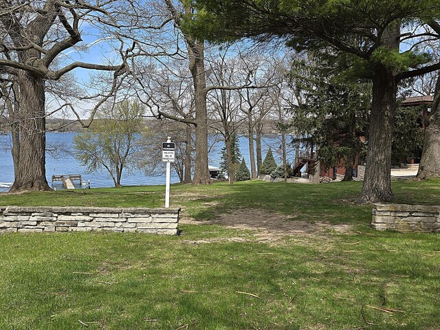 exterior space with a water view