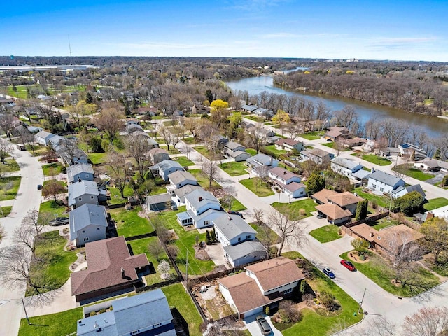 bird's eye view with a residential view and a water view