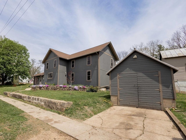 1694 Washington St, Verona, WI 53593 - view of front of house with a front lawn and an outbuilding