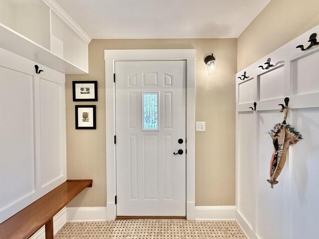 852 Sherwood Dr NW, Beloit, WI 53511 - mudroom featuring baseboards
