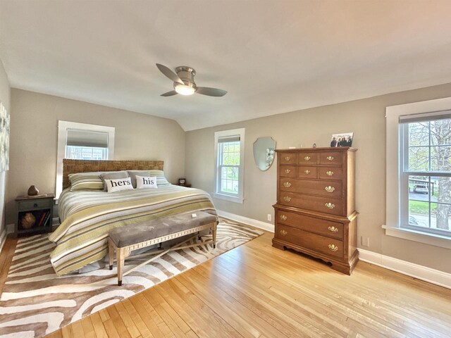 852 Sherwood Dr NW, Beloit, WI 53511 - bedroom with a ceiling fan, baseboards, and light wood finished floors