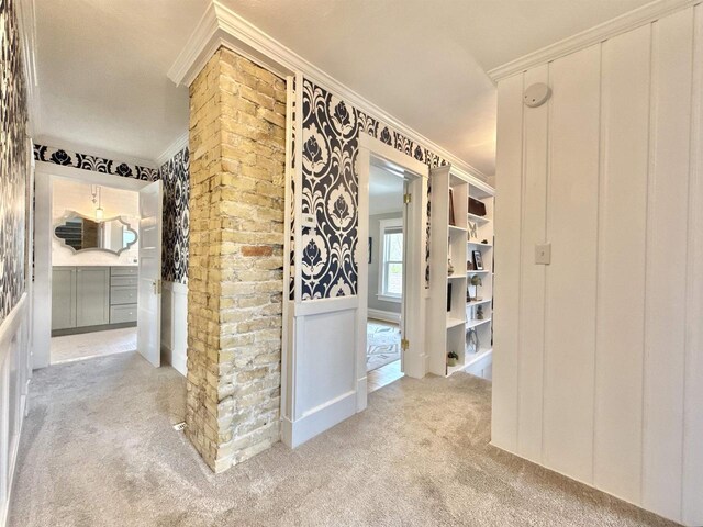 852 Sherwood Dr NW, Beloit, WI 53511 - corridor with crown molding and carpet