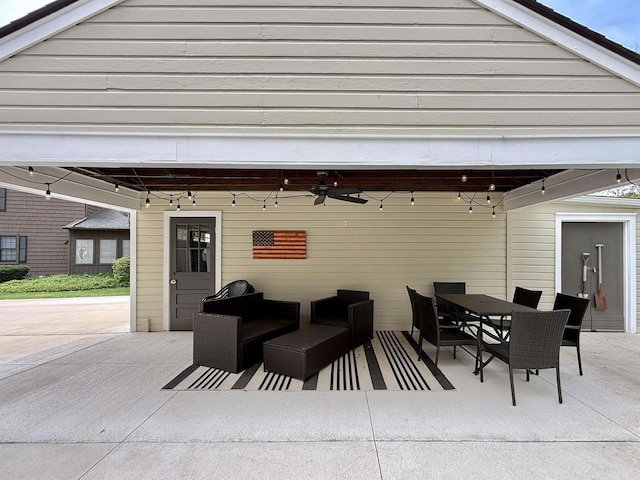 852 Sherwood Dr NW, Beloit, WI 53511 - view of patio with a ceiling fan and outdoor dining space