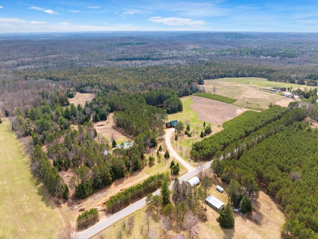 drone / aerial view with a view of trees