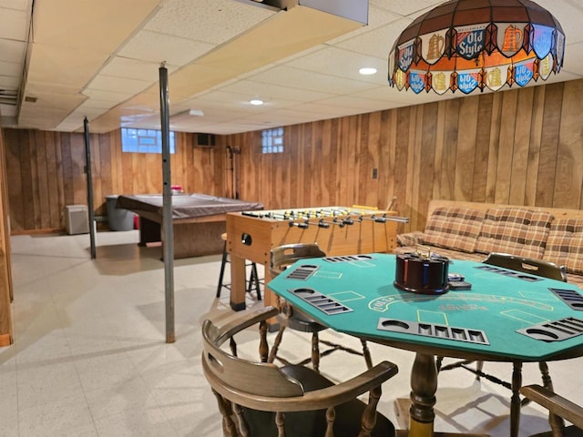 playroom with recessed lighting, wood walls, a paneled ceiling, and tile patterned floors