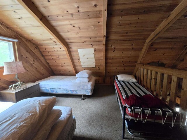 carpeted bedroom featuring wooden walls, wood ceiling, and lofted ceiling