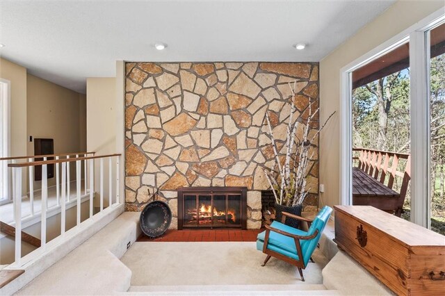 1206 Pinecrest Ln, New Richmond, WI 54017 - sitting room featuring a stone fireplace