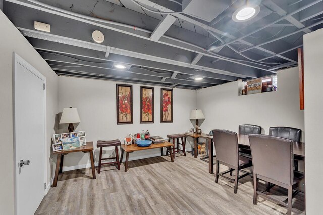 dining room with wood finished floors