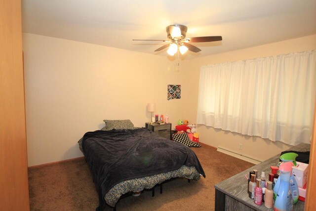 bedroom featuring a ceiling fan, baseboards, baseboard heating, and carpet