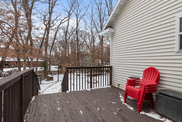 view of snow covered deck