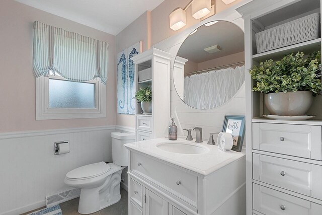 full bath featuring toilet, visible vents, tile patterned flooring, and vanity