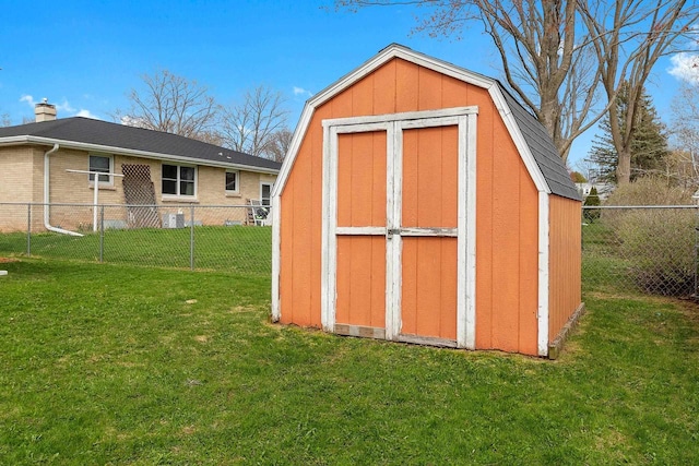 view of shed with fence