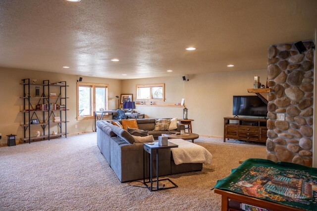 W5588 S Stone Gate Dr, New Lisbon, WI 53950 - living room with recessed lighting, a textured ceiling, baseboards, and carpet