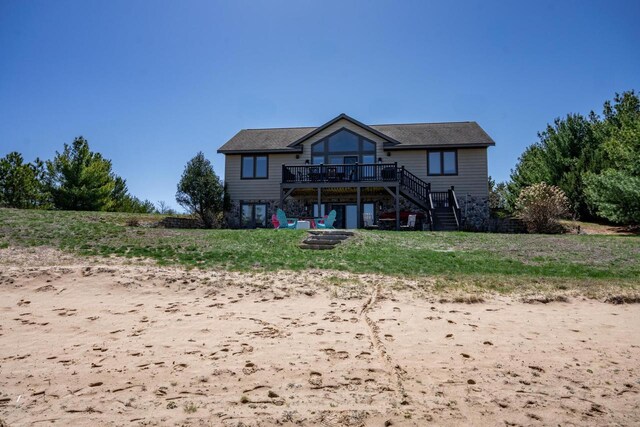 W5588 S Stone Gate Dr, New Lisbon, WI 53950 - back of house with a wooden deck and stairway