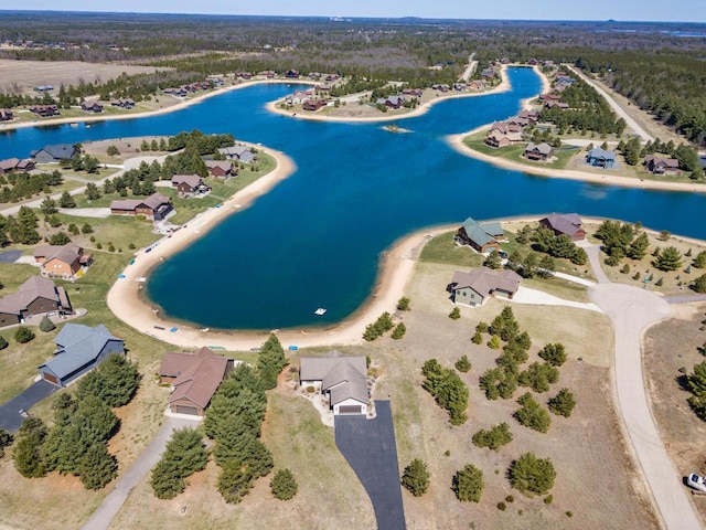 W5588 S Stone Gate Dr, New Lisbon, WI 53950 - drone / aerial view featuring a residential view and a water view
