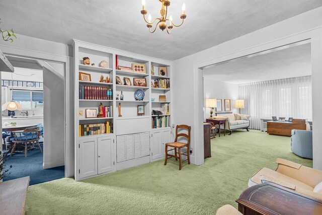 812 Milwaukee St, Kewaunee, WI 54216 - living area featuring carpet floors and a chandelier