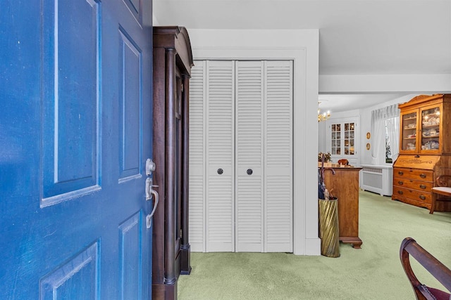 812 Milwaukee St, Kewaunee, WI 54216 - interior space with radiator heating unit and a chandelier