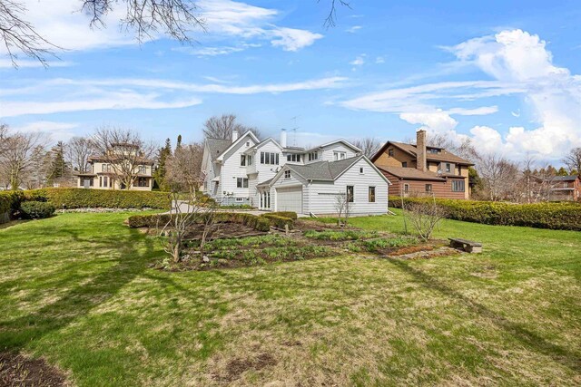 812 Milwaukee St, Kewaunee, WI 54216 - view of yard with a garage