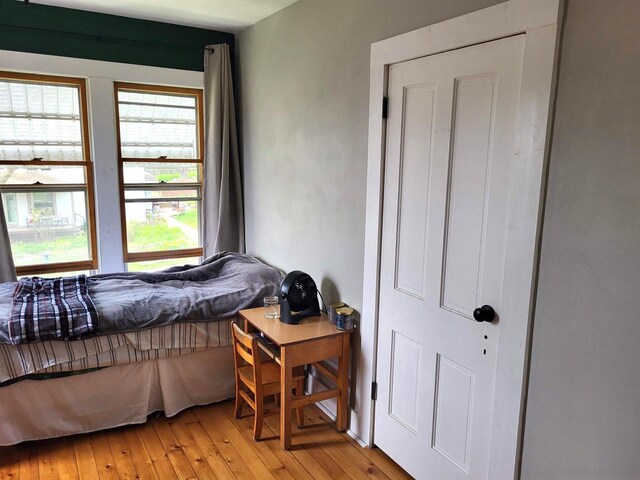 218 7th Ave, New Glarus, WI 53574 - bedroom featuring light wood-style floors