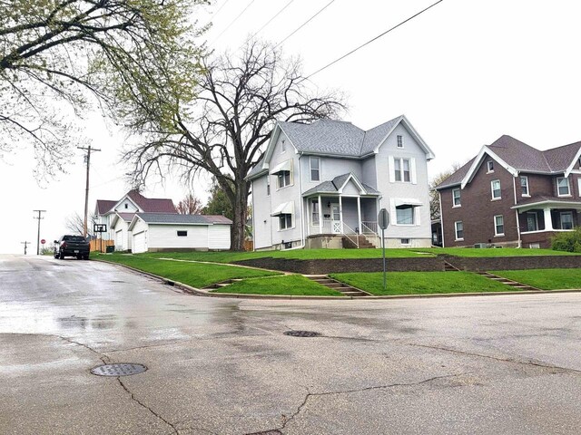 218 7th Ave, New Glarus, WI 53574 - view of front of property featuring a front yard