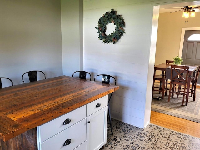 218 7th Ave, New Glarus, WI 53574 - dining room with light tile patterned flooring and ceiling fan