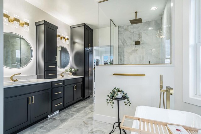 1810 White Dove Ln, Kaukauna, WI 54130 - bathroom featuring a walk in shower, a sink, double vanity, marble finish floor, and a freestanding tub