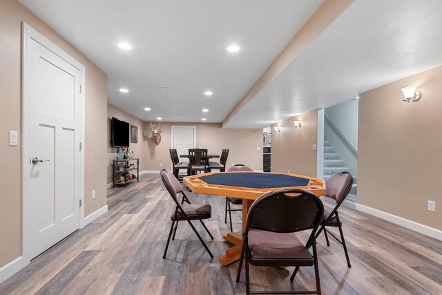 1881 Deer Trail Ct, Luxemburg, WI 54217 - dining space featuring light wood-style floors, baseboards, recessed lighting, and stairs