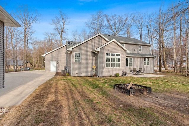 1881 Deer Trail Ct, Luxemburg, WI 54217 - back of house with a patio area, a yard, and cooling unit