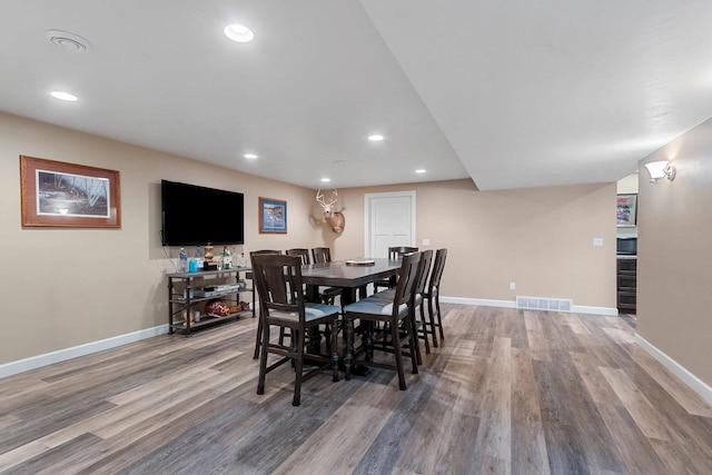 1881 Deer Trail Ct, Luxemburg, WI 54217 - dining room with baseboards, wood finished floors, and visible vents