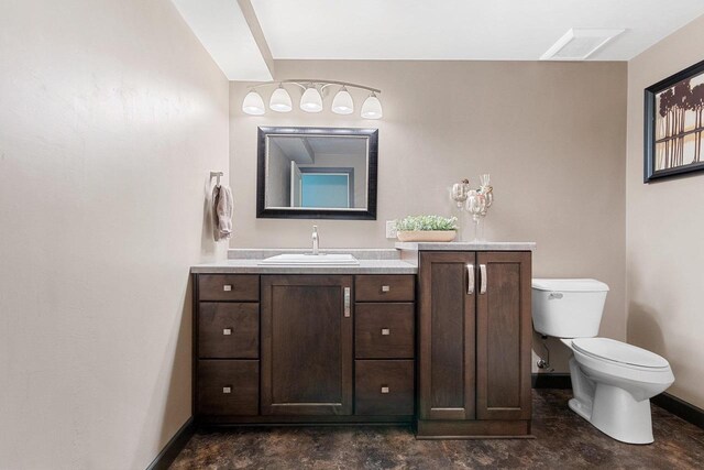 1881 Deer Trail Ct, Luxemburg, WI 54217 - bathroom featuring baseboards, vanity, toilet, and visible vents
