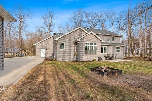 1881 Deer Trail Ct, Luxemburg, WI 54217 - back of house with a patio area, a yard, and cooling unit