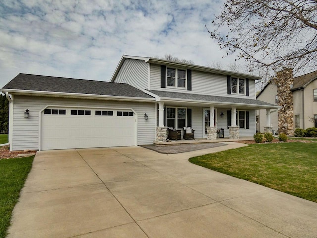 view of front of property with a garage, a front yard, covered porch, and driveway