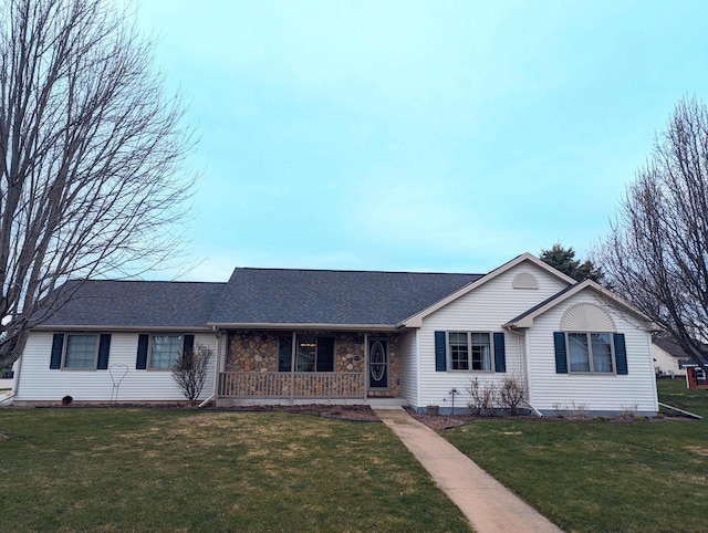 835 Mockingbird Ln, Plymouth, WI 53073 - ranch-style home with a porch, a front lawn, roof with shingles, and stone siding